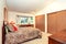 Vaulted ceiling bedroom interior.