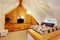 Vaulted ceiling bedroom with wooden paneled wall.