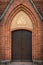 Vaulted entrance door to an old Swedish brick church