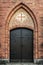 Vaulted and ornamented entrance door to an old Swedish church