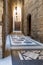 Vaulted passage leading to the Courtyard of Sultan Qalawun mosque with colorful marble floor, Cairo