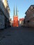 Vaxjo Cathedral with lofty copper clad twin spires under sunlight, Sweden