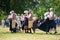 Vaxjo, Sweden, June 2023: People gathered around Maypole during Swedish Midsommar festival in traditional dressing