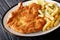 Veal alla Milanese cotoletta alla milanese with French fries c