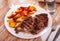 Veal entrecote with grilled potatoes with tomato sauce