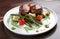 Veal medallions with green beans and Raclette cheese