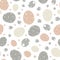 Vector abstract grunge textured pebble seamless pattern background. Monochrome pink and brown flecked stone oval circles