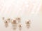 Vector beautiful group of shiny pearls on soft pink background w
