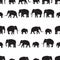 Vector black elephants walking seamless pattern