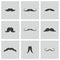 Vector black mustaches icons set