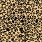Vector black and orange leopard spots seamless pattern texture backgound. Classic animal print perfect for wallpaper