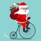 Vector cartoon illustration of Santa Claus riding antique vintage penny-farthing bicycle, with backpack full of gifts on back. Re