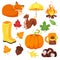 Vector cartoon style set of autumn symbols: fox, pumpkin, yellow boots