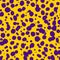 Vector cheetah skin seamless pattern. Trendy wild animal leopard spots, hand drawn yellow and violet texture for fashion