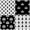 Vector crowns and fleur de lis seamless patterns set in black