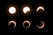 Vector Dark total and partial solar eclipse, several phases. Black background - isolated illustration