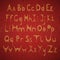 Vector English alphabet embroidered on cardboard