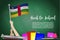 Vector flag of Central African Republic on Black chalkboard background. Education Background with Hands Holding Up of Central Afri