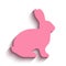 Vector flat pink side silhouette of a rabbit with long shadow isolated on a white background