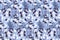 Vector floral seamless pattern. Lilac flowers with light brown twigs and blue leaves on a blue.