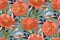 Vector floral seamless pattern. Orange and coral-colored flowers, leaves and herbs.