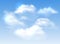 Vector fluffy realistic white clouds on blue sky background