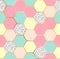 Vector geometric seamless repeating pattern with hexagonal honey comb shapes in pastel colors in golden structure