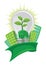 Vector of green leaf and earth in lightbulb, in front of buildings