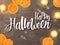 Vector halloween poster with hand lettering greetings label - happy halloween - on desk with gerbera flower and candle
