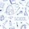 Vector hand drawn back to school seamless pattern. School equipment doodles on ruled paper.