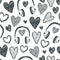 Vector hand drawn seamless pattern. Hearts, retro headphones, music background. Black and white doodle