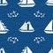 Vector hand drawn white sailing boats and sets of anchors. Seamless geometric pattern on navy blue background. Great for