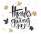 Vector hand lettering thanksgiving greetings text - thanksgiving day - with leaves in gold color