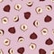 Vector hazelnut seamless pattern isolated on pink background.