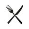 Vector illustration of crossed fork and knife icon. Isolated.