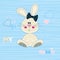 Vector illustration of a cute beige bunny girl baby in a striped blue background with hearts in pastel colors.