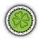 Vector illustration with dotted lucky four leaf clover or shamrock and round mandala in black and green isolated on white.