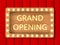 Vector illustration. Grand opening text. Wooden frame with bulbs