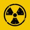 Vector illustration of grunge black radioactive hazard warning sign painted over yellow background