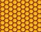 Vector illustration. Seamless honeycomb background pattern. Shiny hexagonal cells. Honey comb pattern is suitable for packaging de