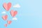 Vector of love and Happy Valentine`s day. origami design elements cut paper made pink heart float up on the blue sky