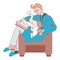 A vector man in a bathrobe and slippers sits across the chair with a cat and a book on his lap