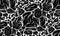 Vector monochrome seamless pattern with broken stones. Earthquake and destruction. Texture with black smashed rocks with cracks