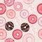 Vector pattern with sweet pink donuts for design