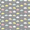 Vector pattern with umbrellas, clouds and raindrops. Colorful seamless background for kids.