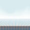 Vector picnic table covered with tablecloth on blue background. - Vector