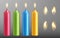 Vector realistic candle set with fire isolated on transparent background. Diferent color candles collection with flame for
