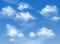 Vector realistic soft fluffy clouds and airplane traces in the blue sky
