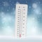 Vector realistic thermometer showing freezing temperature in snow with blue blurred background