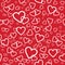 Vector red seamless pattern with random hearts